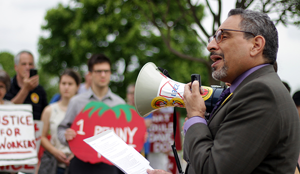 Tony de la Rosa, Interim Executive Director of the Presbyterian Mission Agency, speaking to crowds at last month's massive protest in front of the Wendy's shareholder meeting