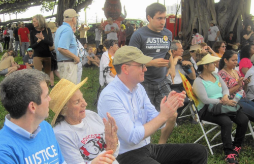 Ethel Kennedy (center), widow of Robert Kennedy, sits with grandson-in-law, Liam Kerr (left) and the Rev. Matt Malone a Jesuit priest, after Saturday's march.