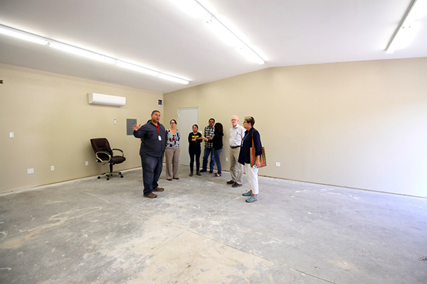 Rev. Edmiston receiving a tour of Sunripe Certified Tomato’s new, in-progress training facility – tailored specifically to host the worker-to-worker education sessions farmworkers receive as part of the Fair Food Program.