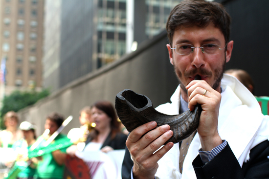 Rabbi from T'ruah:  The Rabbinic Call for Human Rights sounding the call for action in front of Wendy's Board Chairman Nelson Peltz's offices in July 2014
