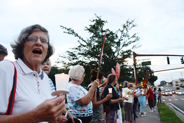 United Methodist Women hold a powerful 70-person vigil outside a Publix store in Lakeland during their gathering in the summer of 2013